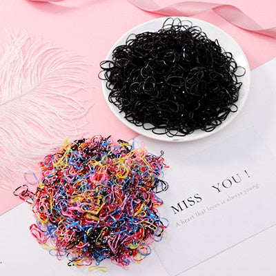 Package of 1000 disposable colorful mini rubber bands