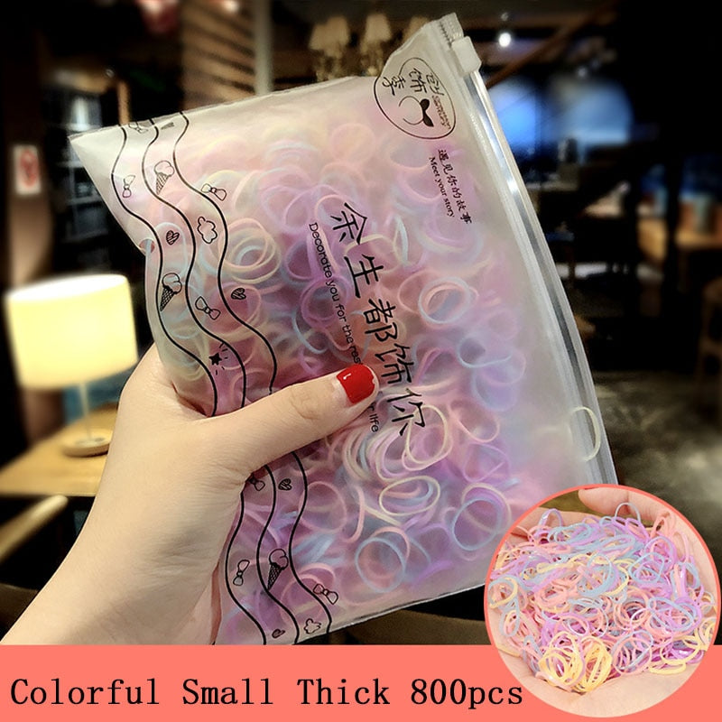 Package of 1000 disposable colorful mini rubber bands