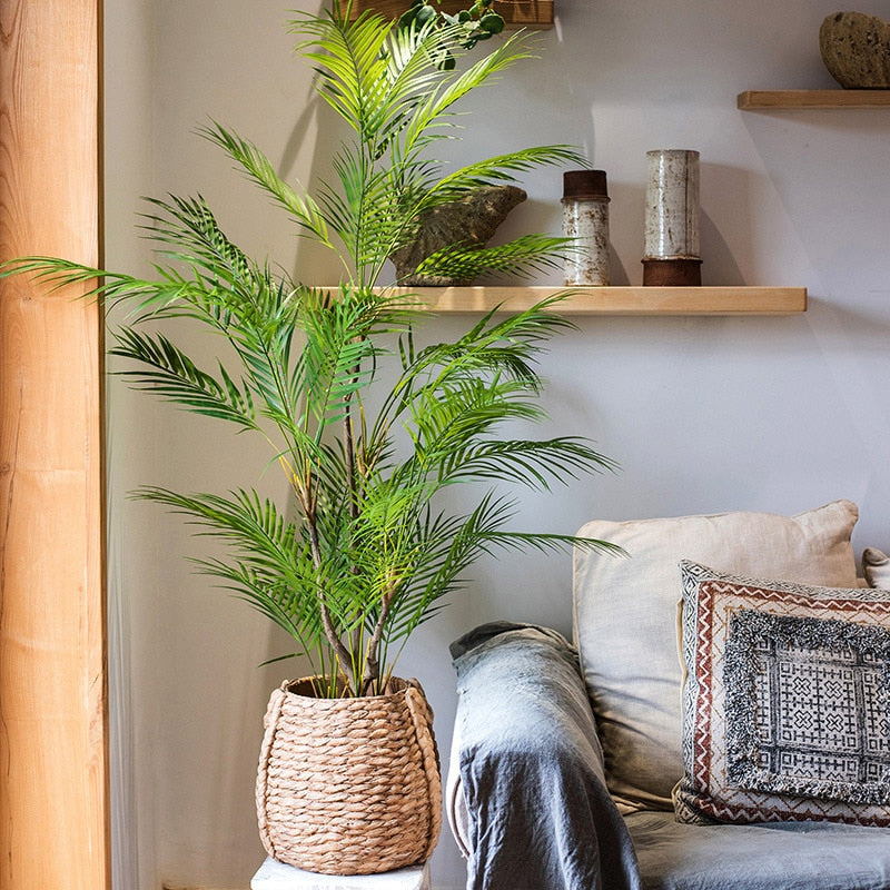 This 125cm tall large artificial palm tree is the perfect way to go