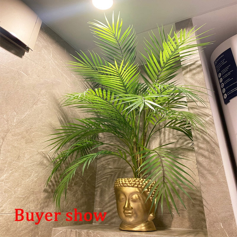 This 125cm tall large artificial palm tree is the perfect way to go