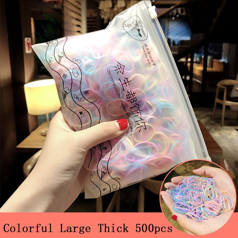 Package of 1000 disposable colorful mini rubber bands