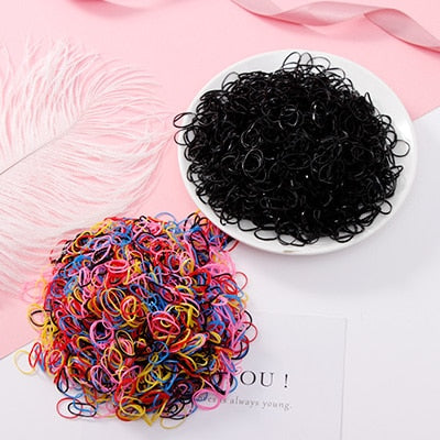 Package of 1000 disposable colorful mini rubber bands