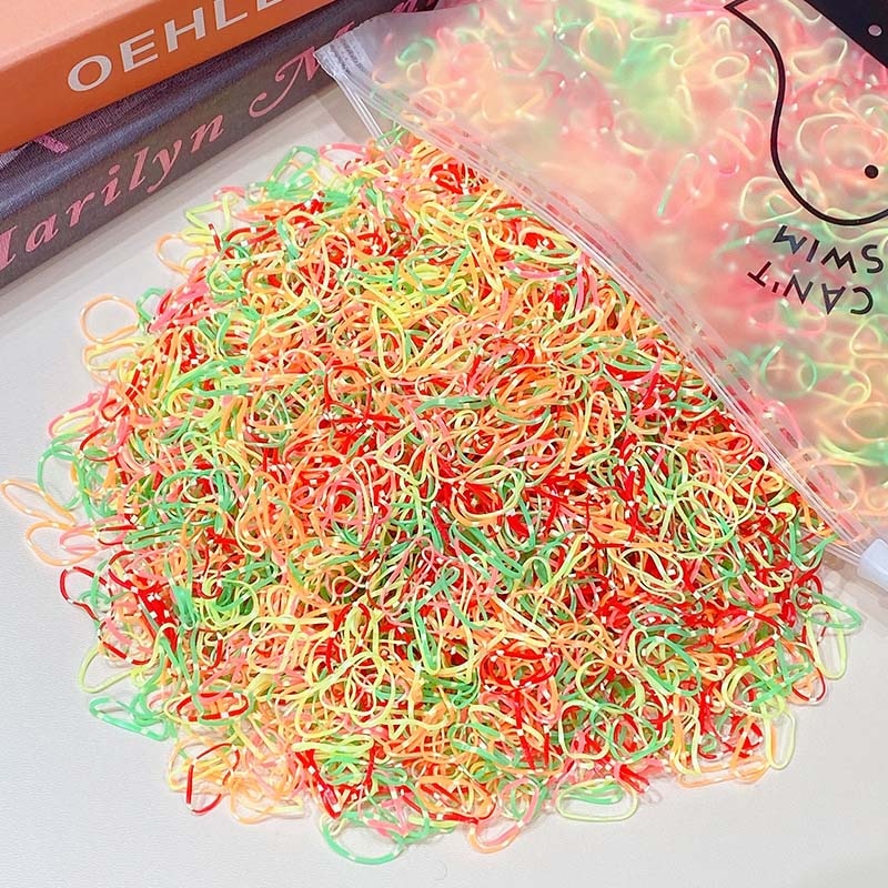 Package of 1000 disposable colorful mini rubber bands