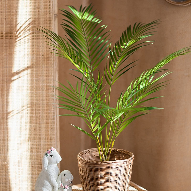 This 125cm tall large artificial palm tree is the perfect way to go