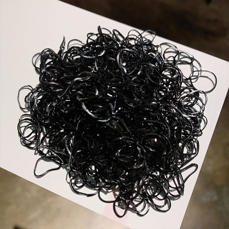 Package of 1000 disposable colorful mini rubber bands