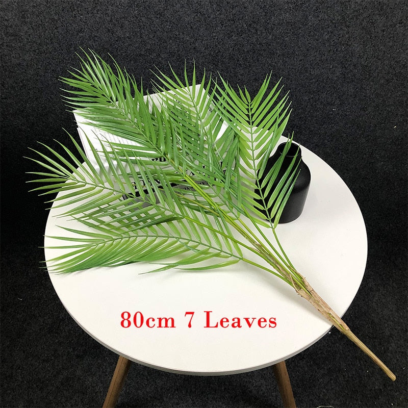 This 125cm tall large artificial palm tree is the perfect way to go