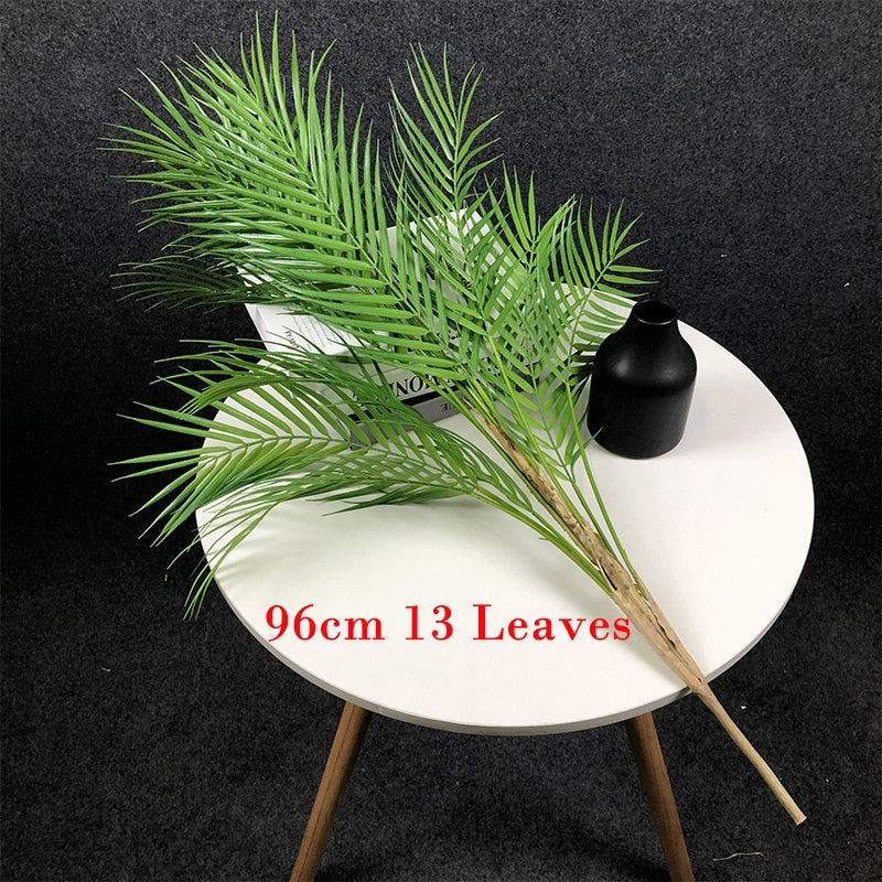 This 125cm tall large artificial palm tree is the perfect way to go