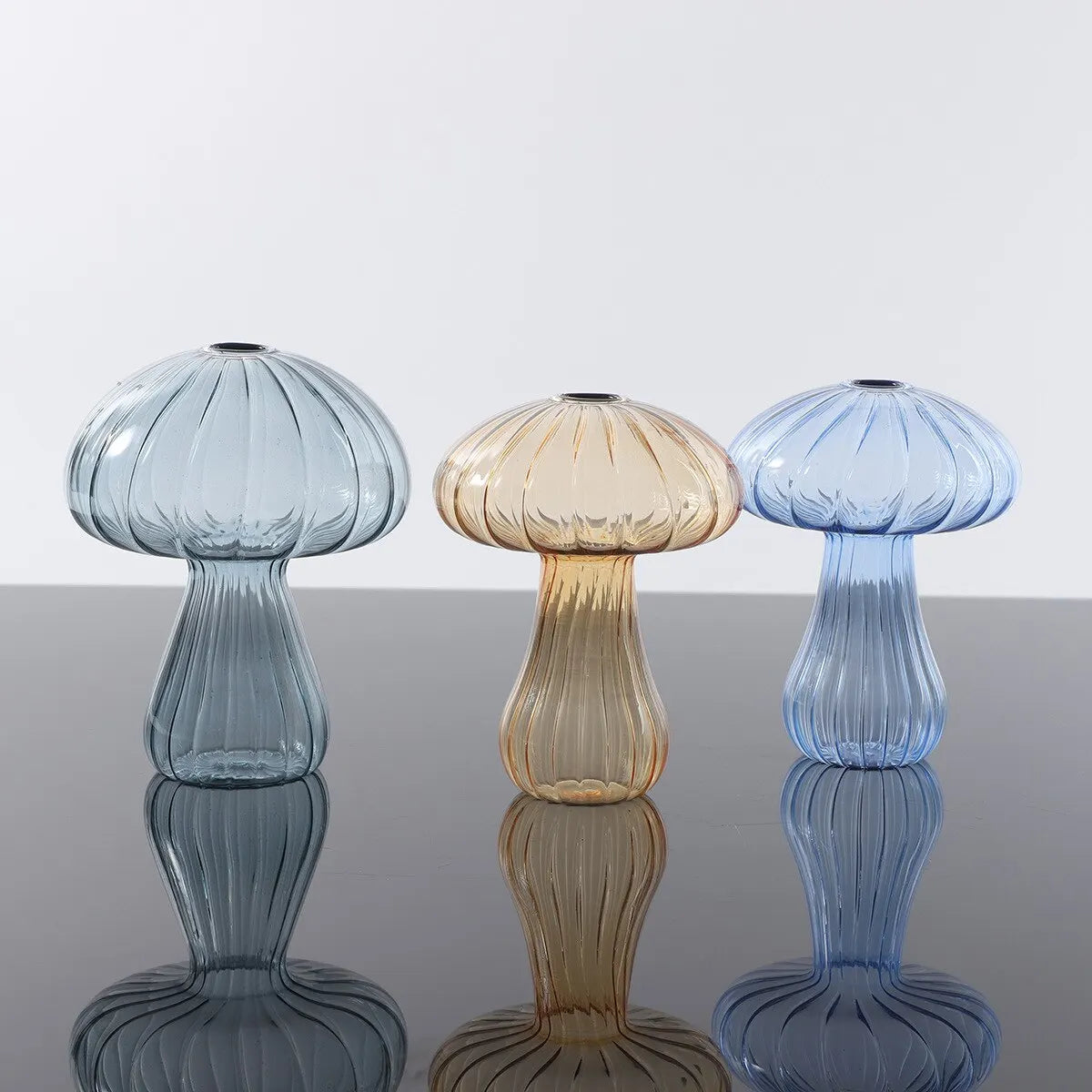 This charming one-piece mushroom shaped glass vase is more than just a flower container