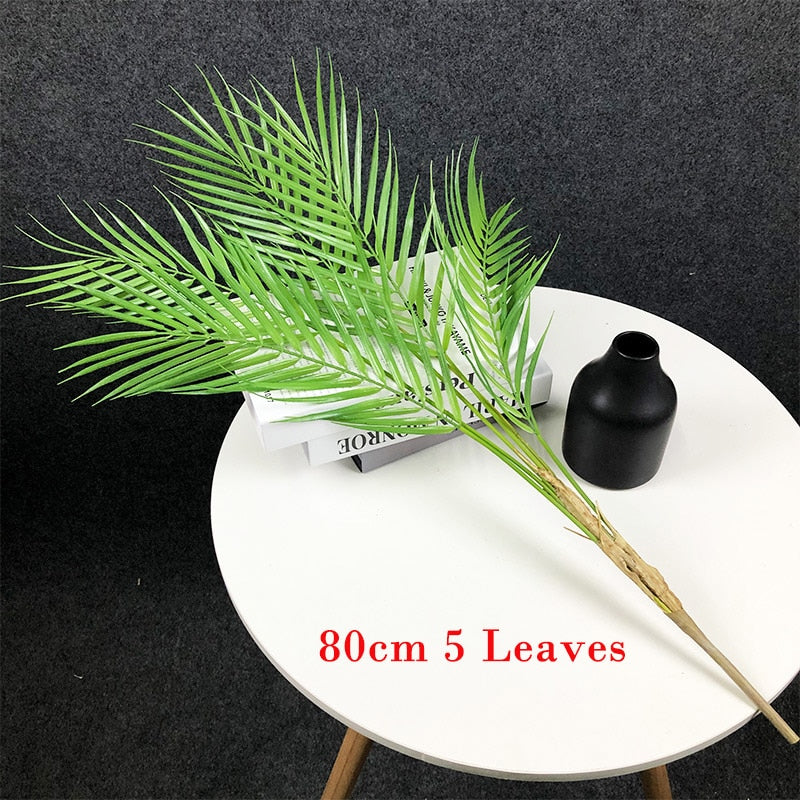 This 125cm tall large artificial palm tree is the perfect way to go