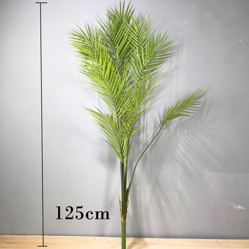 This 125cm tall large artificial palm tree is the perfect way to go